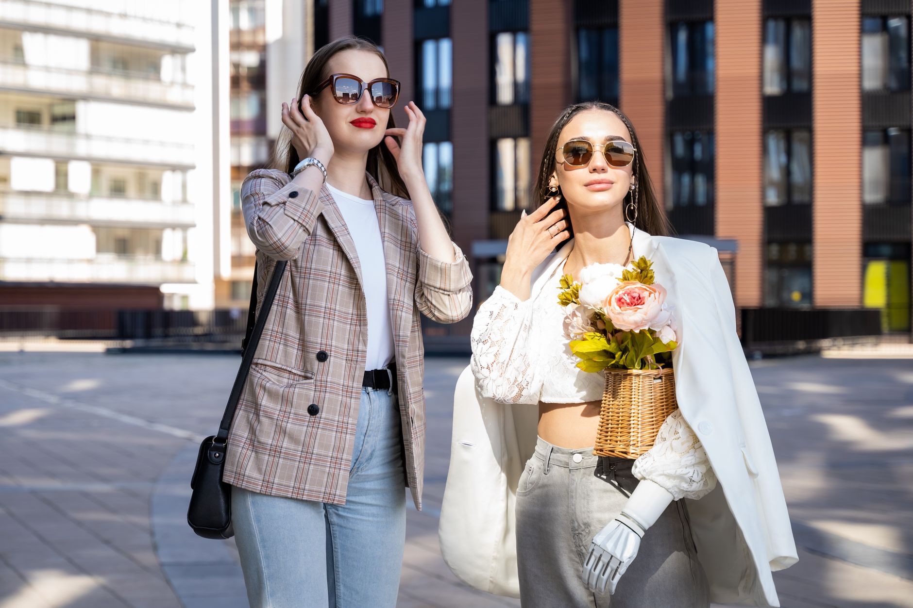 Two stylish women enjoy a sunny day in the city wearing chic outfits and sunglasses. — The Homework Debate and Strategies for